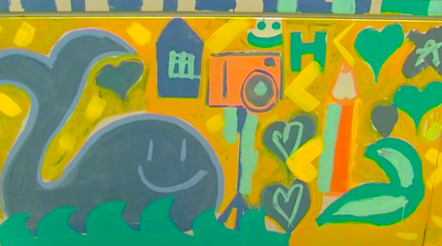 Niños del Gregorio Marañón crean un mural junto a artistas del grafiti